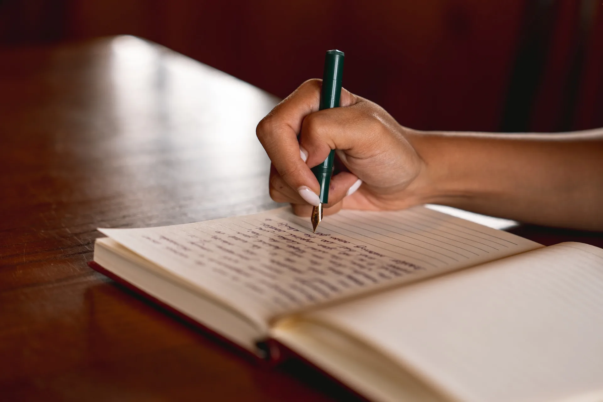 Person writing in a journal